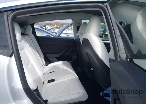 2023 Tesla Model Y Awd/Long Range Dual Motor All-Wheel Drive z USA, uszkodzony, nr VIN 7SAYGAEE4PF856425